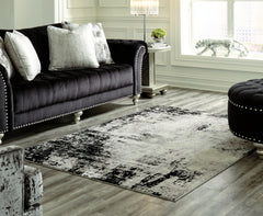 Hoover Furniture Outlet - Ashley Furniture - Zekeman 7'10" x 10' Rug - 7'10" x 10' Rug - R404921