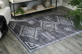 Hoover Furniture Outlet - Ashley Furniture - Arloman 5' x 7' Washable Rug - 5' x 7' Washable Rug - R405932