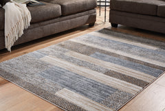 Hoover Furniture Outlet - Ashley Furniture - Sethburn 8' x 10' Rug - 8' x 10' Rug - R406591