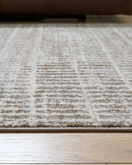 Fuadwick 7'10" x 10' Area Rug