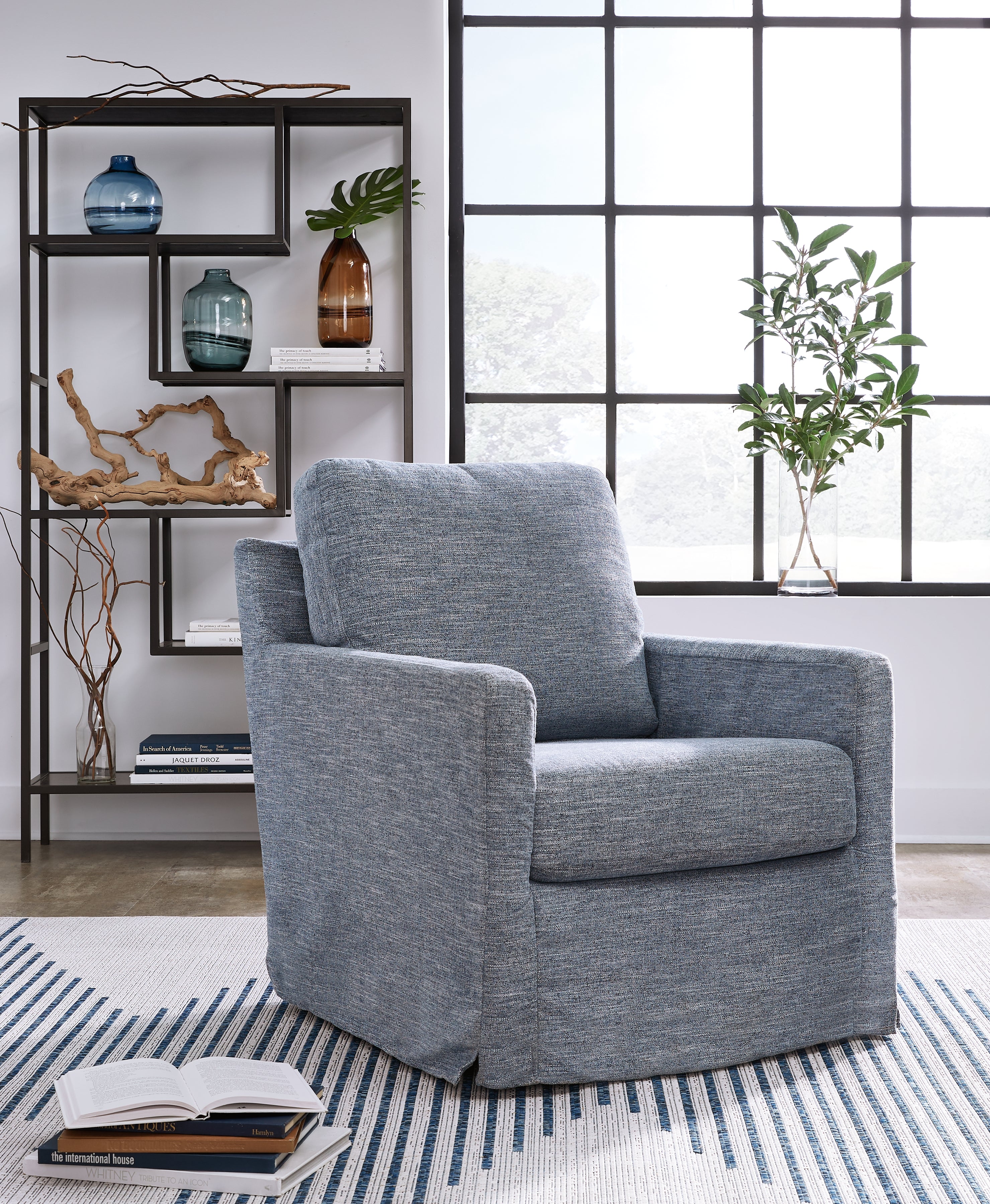 Hoover Furniture Outlet - Ashley Furniture - Nenana Next-Gen Nuvella Swivel Glider Accent Chair - Swivel Glider Accent Chair / Denim - A3000646