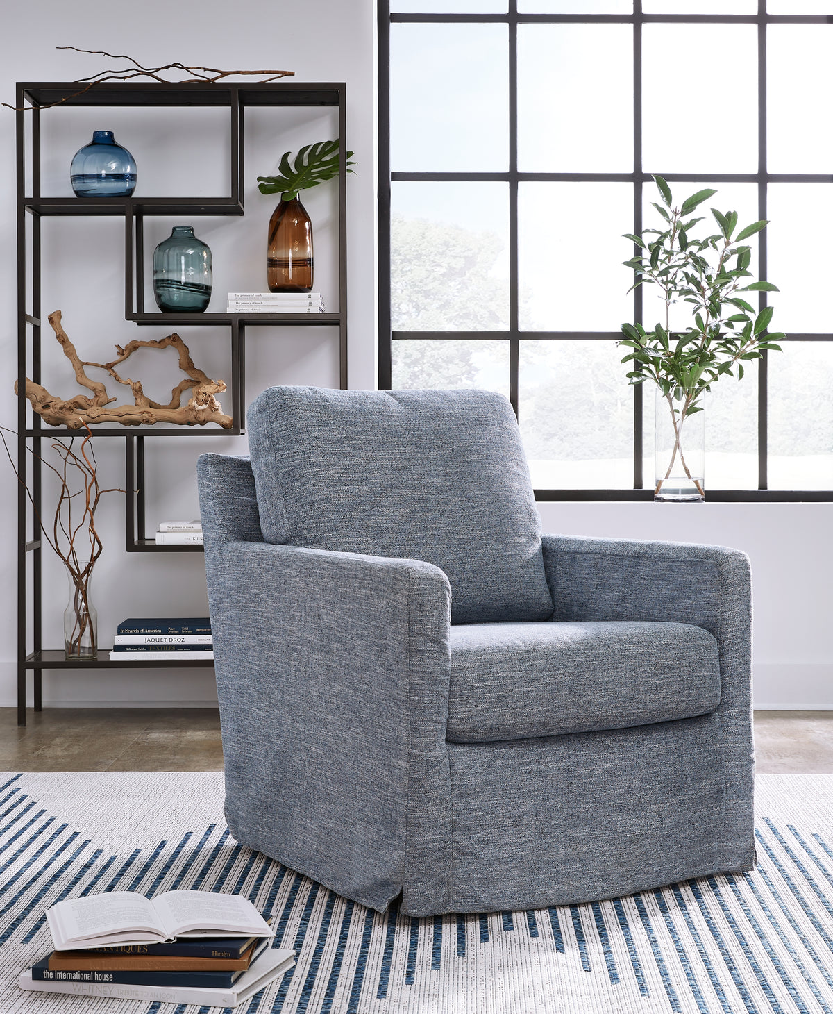 Hoover Furniture Outlet - Ashley Furniture - Nenana Next-Gen Nuvella Swivel Glider Accent Chair - Swivel Glider Accent Chair / Denim - A3000646