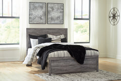 Hoover Furniture Outlet - Ashley Furniture - Bronyan Queen Panel Bed - Queen Panel Bed / Dark Gray - B1290B2