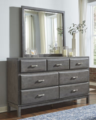 Hoover Furniture Outlet - Ashley Furniture - Caitbrook Dresser and Mirror - Dresser and Mirror / Gray - B476B1