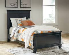 Hoover Furniture Outlet - Ashley Furniture - Lanolee Twin Panel Bed - Twin Panel Bed / Black - B687B2