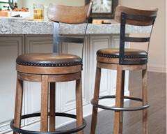 Hoover Furniture Outlet - Ashley Furniture - Pinnadel Bar Height Bar Stool - Tall UPH Swivel Barstool(1/CN) / Light Brown - D542-130