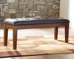 Hoover Furniture Outlet - Ashley Furniture - Ralene Dining Bench - Large UPH Dining Room Bench / Medium Brown / 50"W x 16"D x 19"H - D594-00