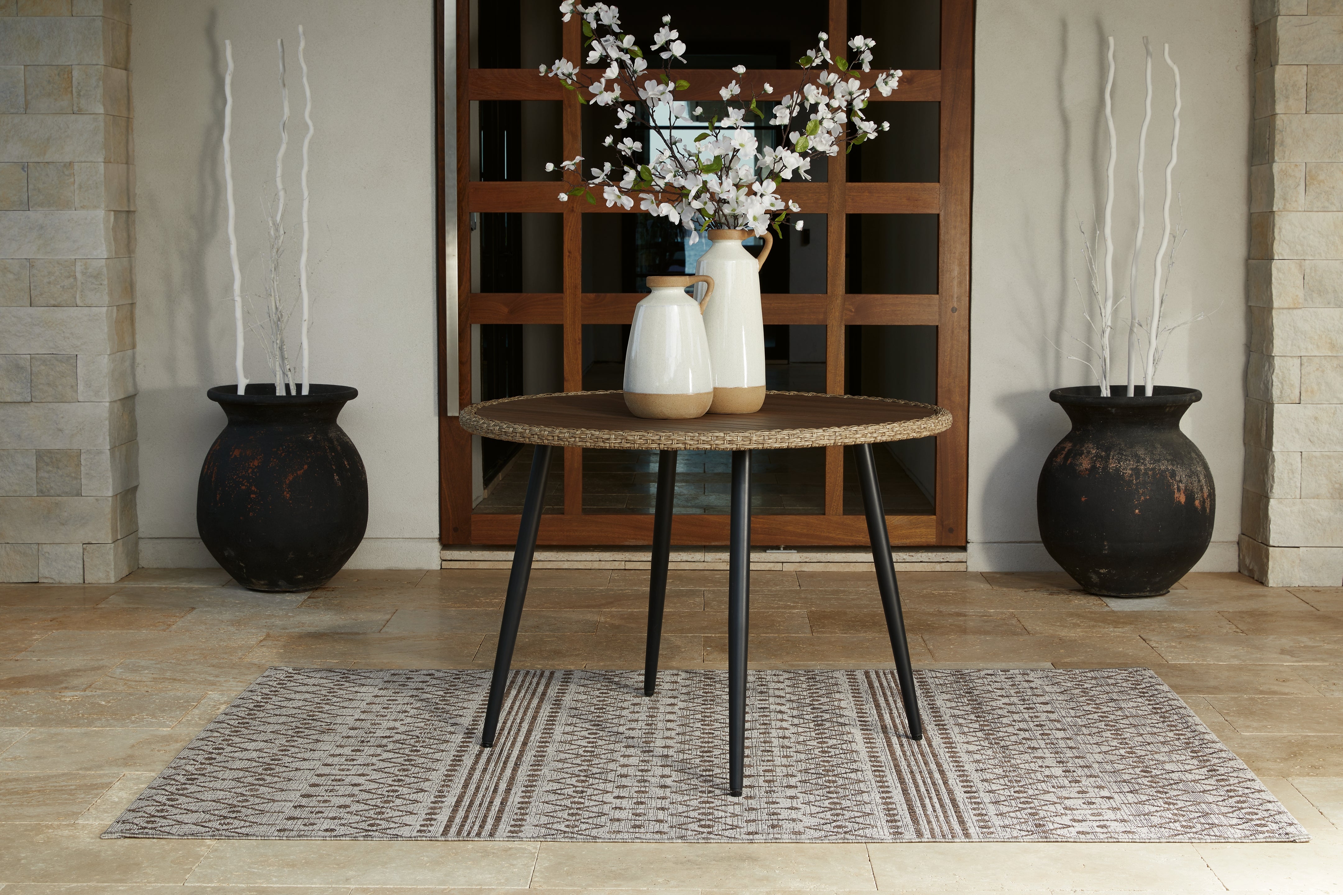 Hoover Furniture Outlet - Ashley Furniture - Amaris Outdoor Dining Table - Round Dining Table / Brown/Black - P369-615