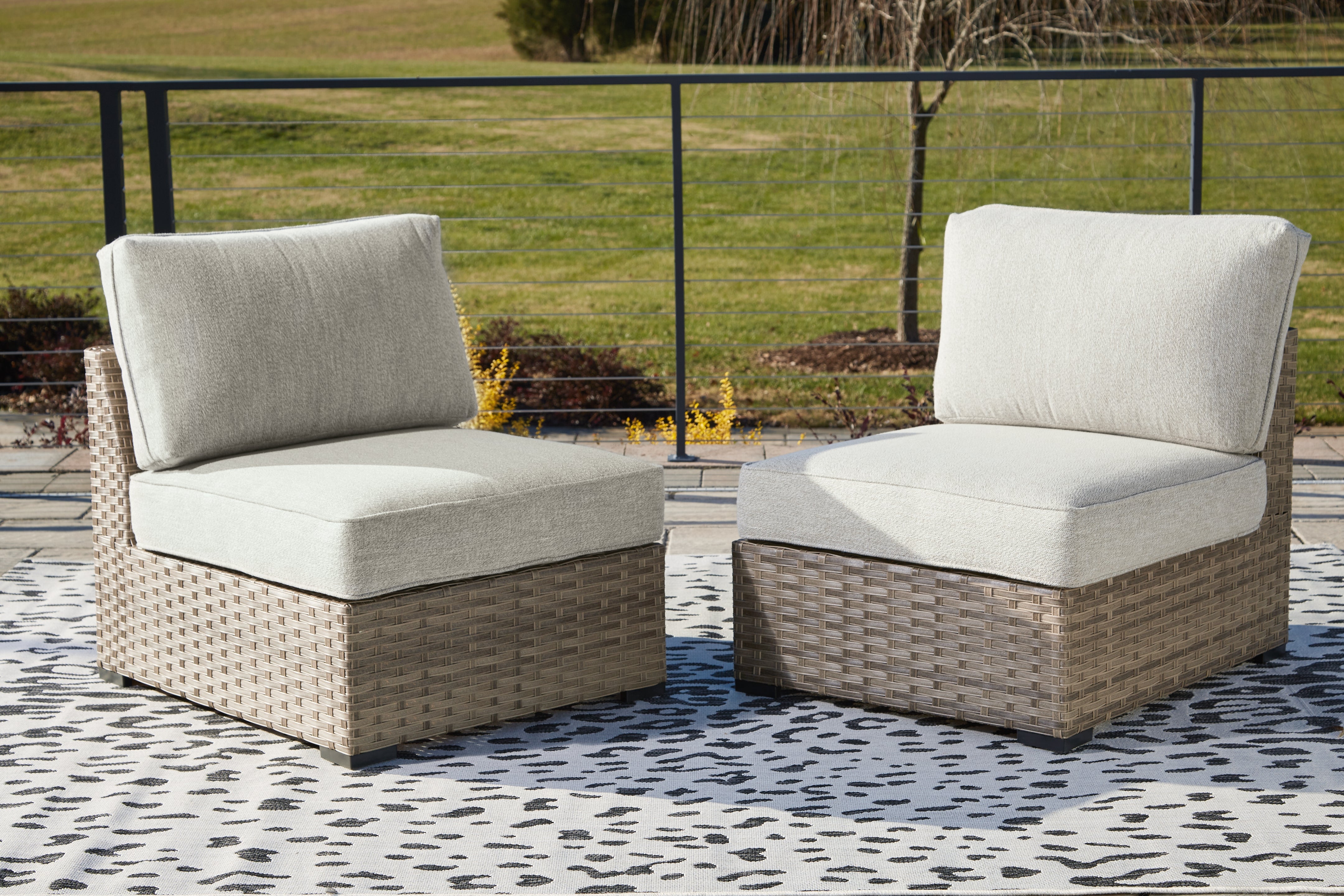Hoover Furniture Outlet - Ashley Furniture - Calworth Outdoor Armless Chair with Cushion (Set of 2) - Armless Chair w/Cushion (Set of 2) / Beige - P458-846