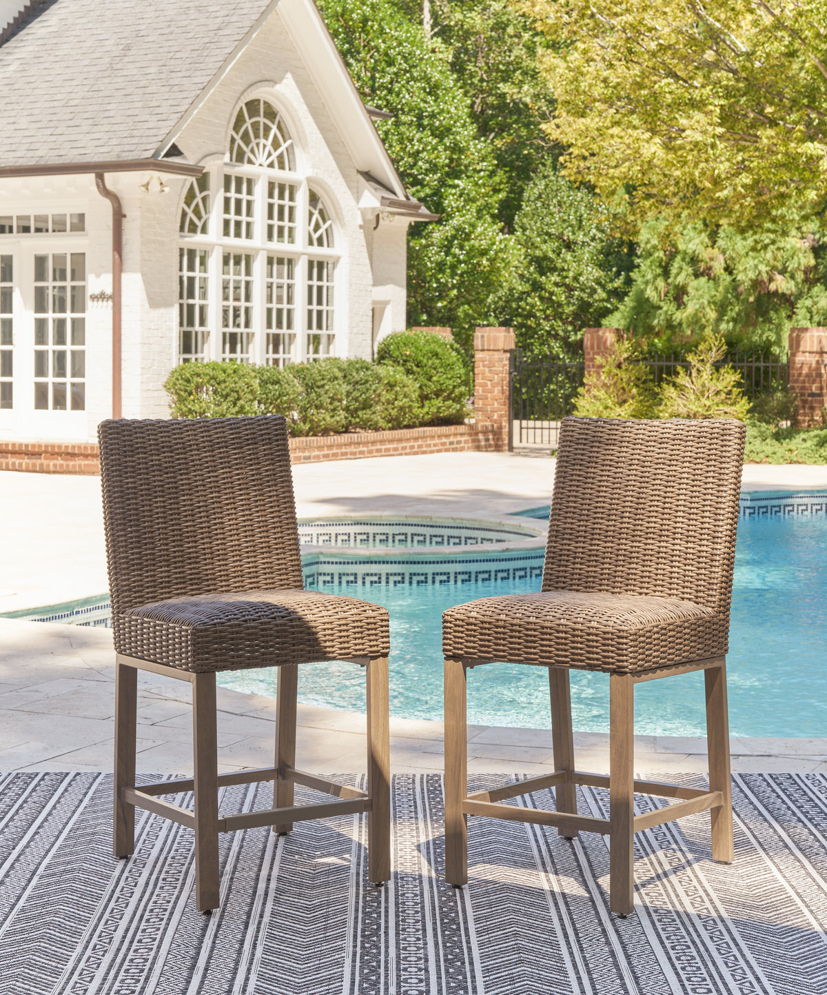 Hoover Furniture Outlet - Ashley Furniture - Walton Bridge Outdoor Bar Stool (Set of 2) - Barstool (Set of 2) / Driftwood - P749-130