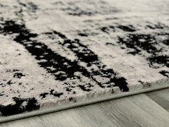 Hoover Furniture Outlet - Ashley Furniture - Zekeman 5'3" x 7'7" Rug - 5'3" x 7'7" Rug / Black/Cream/Gray - R404922
