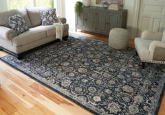 Hoover Furniture Outlet - Ashley Furniture - Hilcott 7'10" x 10'6" Rug - 7'10" x 10'6" Rug / Blue/Cream/Brown - R406111
