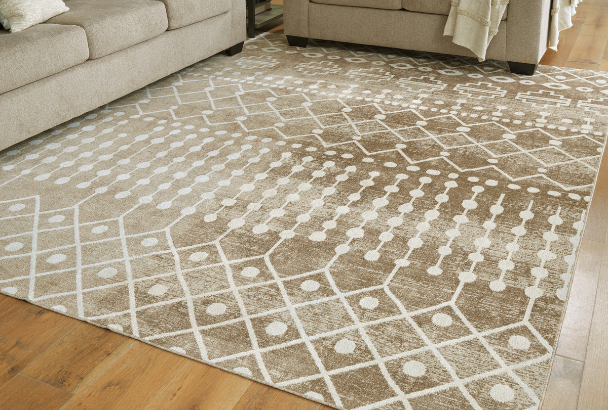 Hoover Furniture Outlet - Ashley Furniture - Bunchly 7'10" x 10'3" Washable Rug - 7'10" x 10'3" Washable Rug / Tan/Brown/Cream - R406221