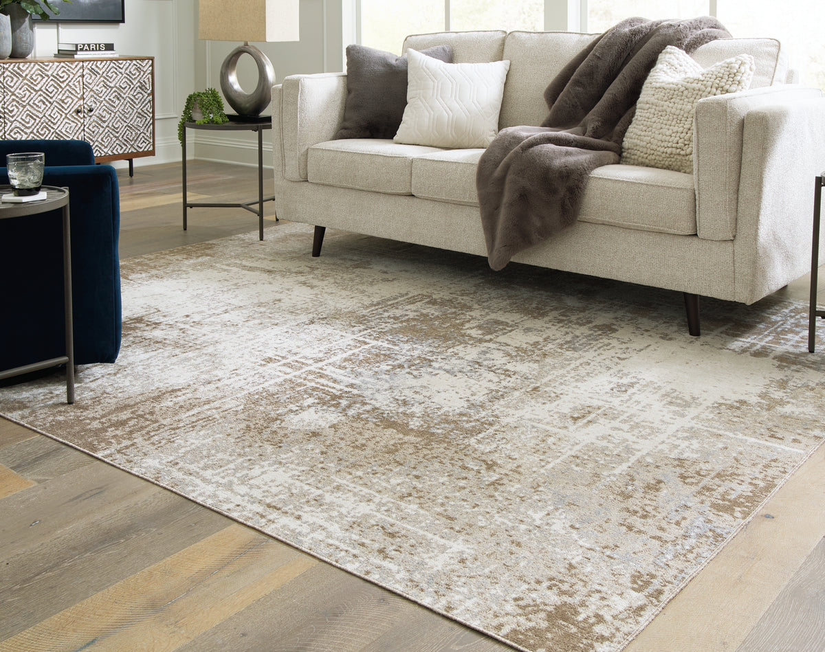 Hoover Furniture Outlet - Ashley Furniture - Grifflain 7'10" x 10'3" Washable Rug - 7'10" x 10'3" Washable Rug / Tan/Brown/Gray - R406231
