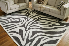 Hoover Furniture Outlet - Ashley Furniture - Thomwith 8' x 10'2" Washable Rug - 8' x 10'2" Washable Rug / Black/Ivory - R406291