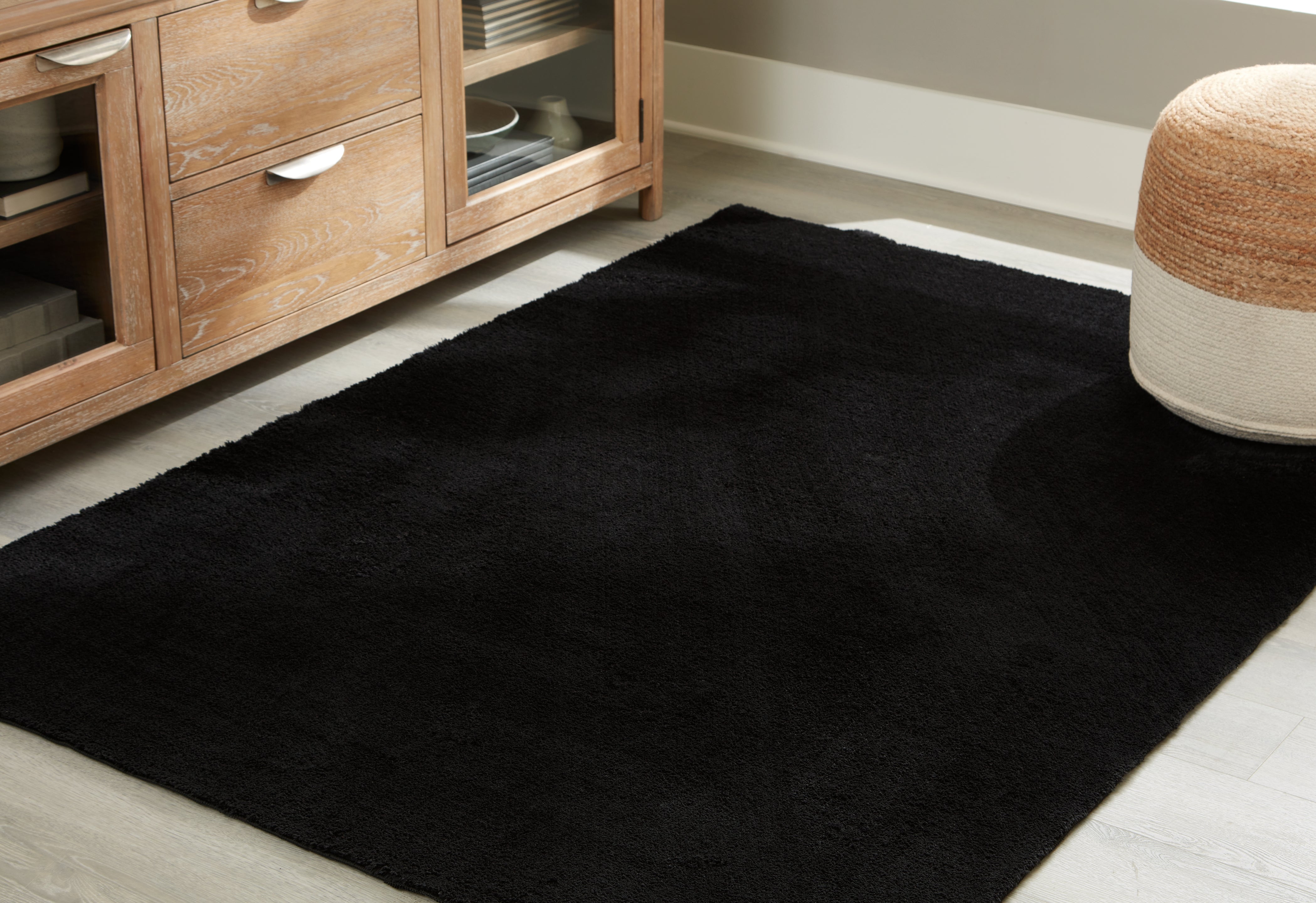 Hoover Furniture Outlet - Ashley Furniture - Anaben 5' x 7' Washable Rug - 5' x 7' Washable Rug / Black - R406312