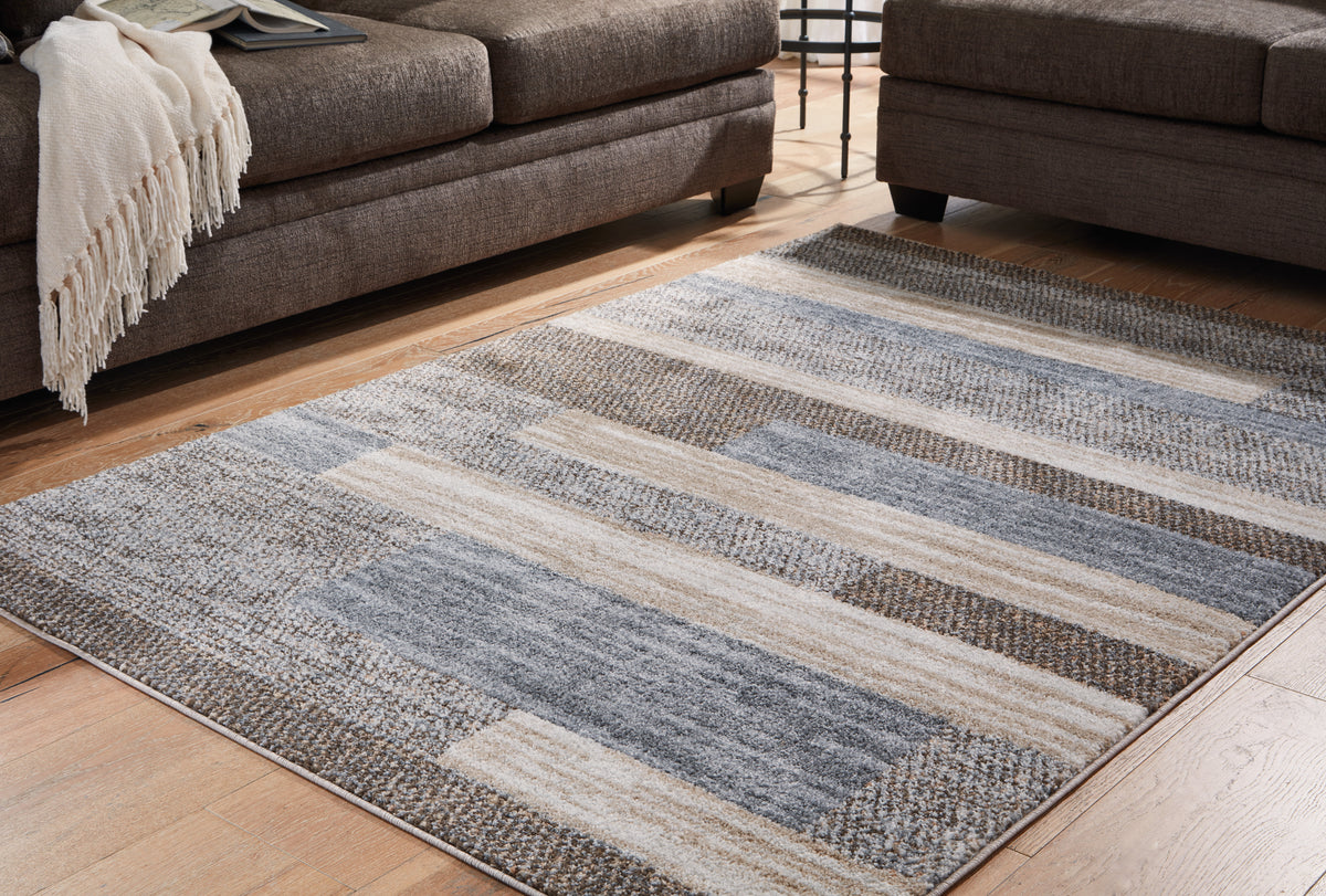 Hoover Furniture Outlet - Ashley Furniture - Sethburn 8' x 10' Rug - 8' x 10' Rug - R406591
