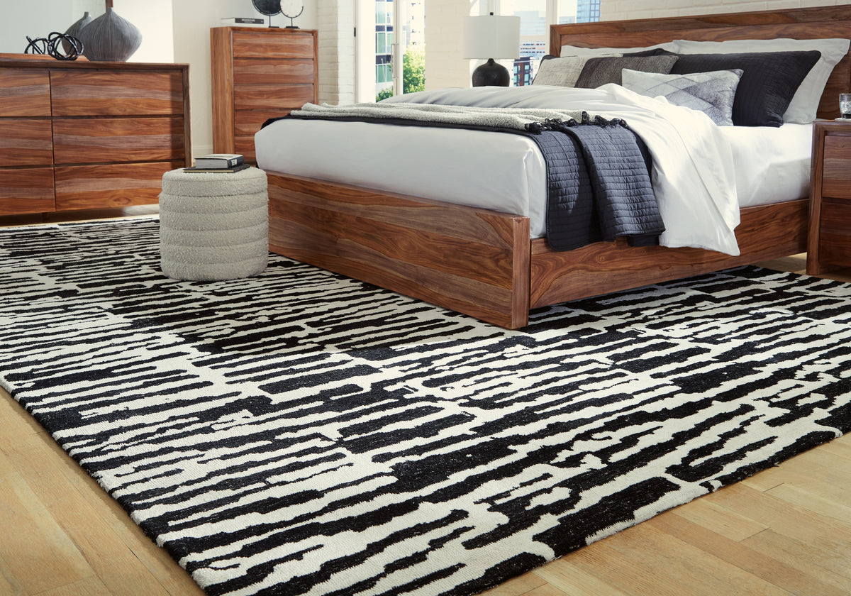 Hoover Furniture Outlet - Ashley Furniture - Bramshaw 10' x 14' Rug - 10' x 14' Rug / Black/Ivory - R406760