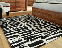 Hoover Furniture Outlet - Ashley Furniture - Bramshaw 5' x 7' Rug - 5' x 7' Rug / Black/Ivory - R406762