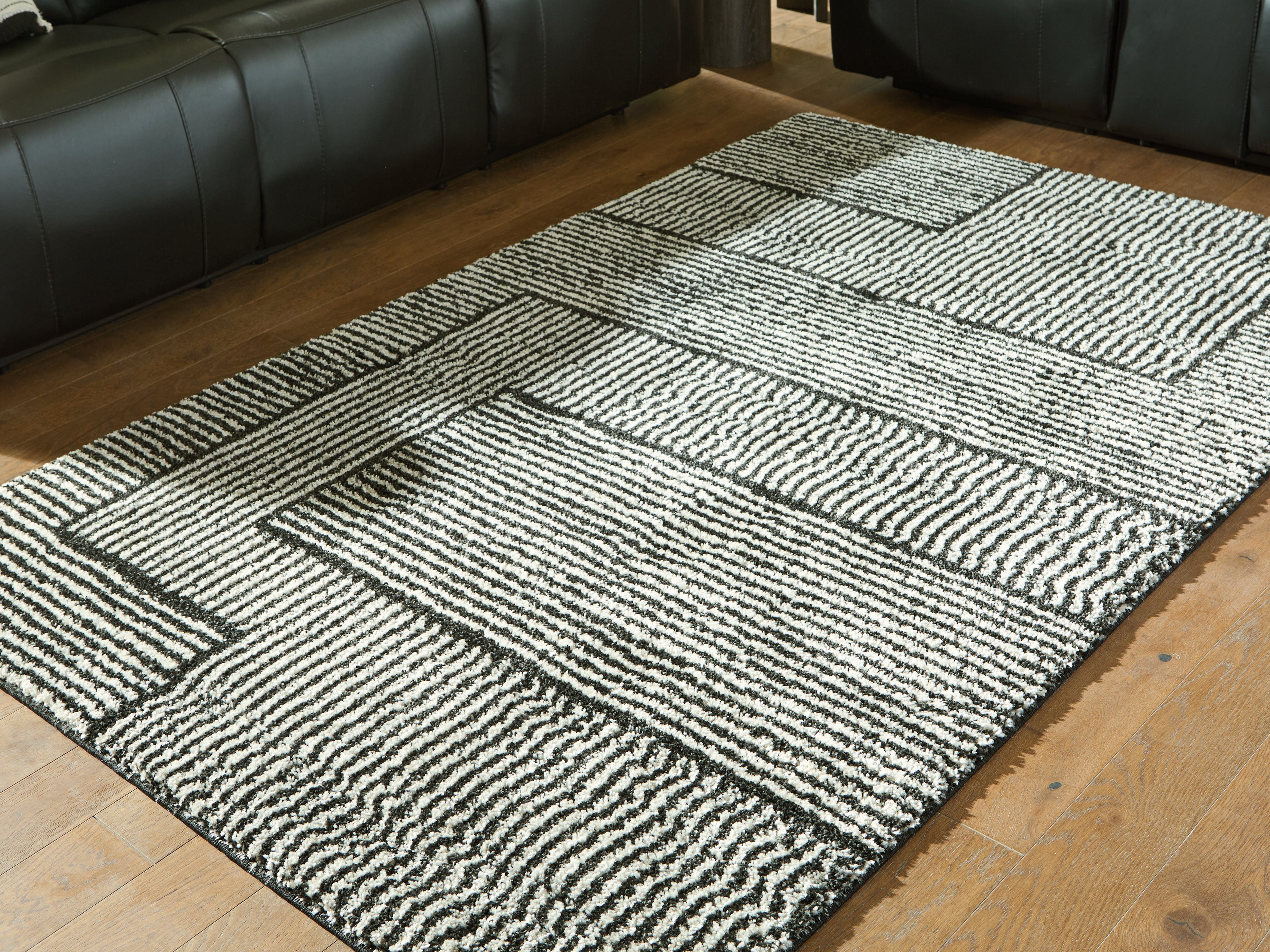 Hoover Furniture Outlet - Ashley Furniture - Kurtmen 5' x 7' Area Rug - 5' x 7' Area Rug - R407592
