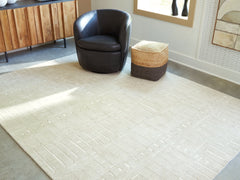 Hoover Furniture Outlet - Ashley Furniture - Wolbert 7'8" x 10' Area Rug - 7'8" x 10' Area Rug / Tan/Ivory - R407661