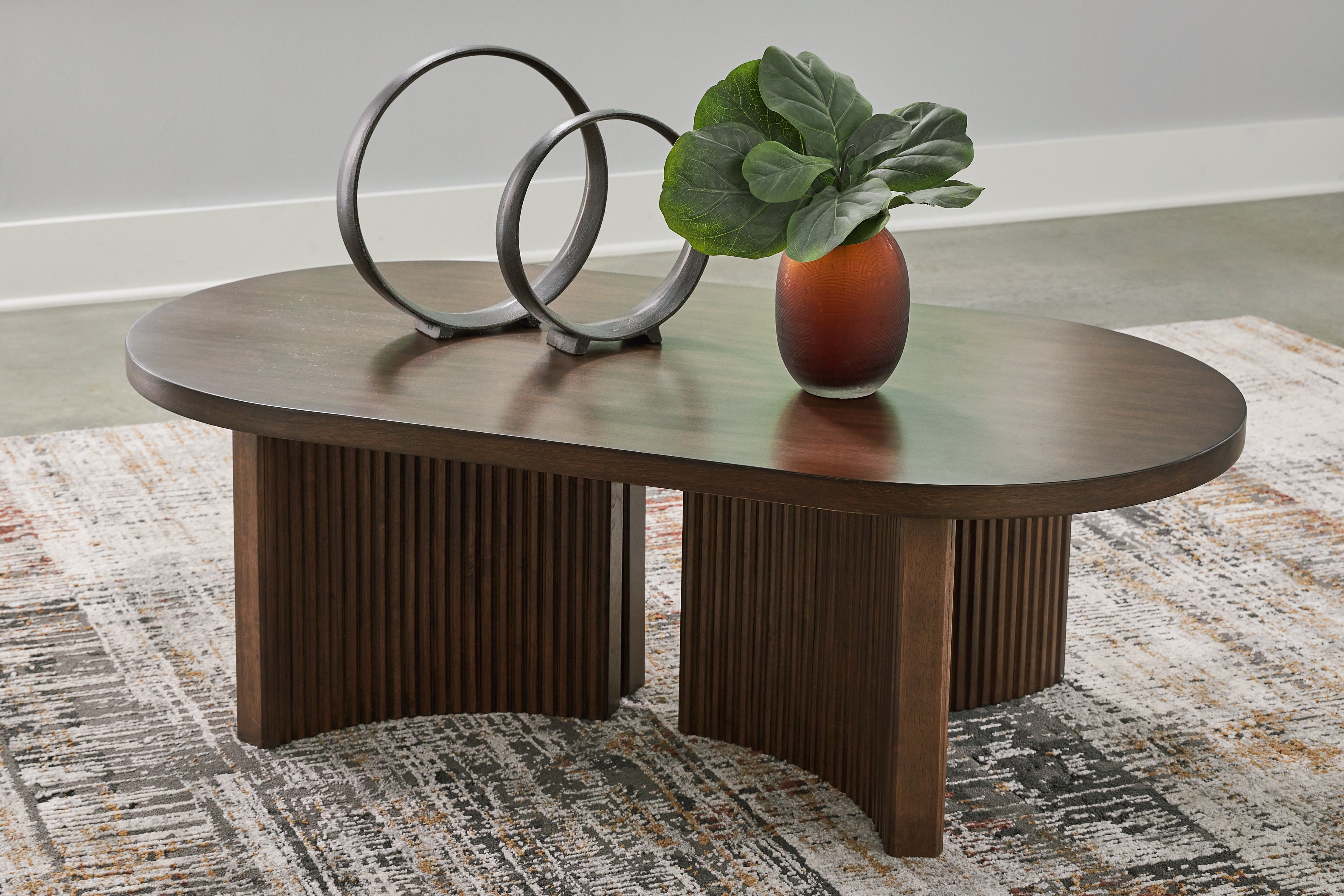 Hoover Furniture Outlet - Ashley Furniture - Korestone Coffee Table - Oval Cocktail Table / Dark Brown - T689-0